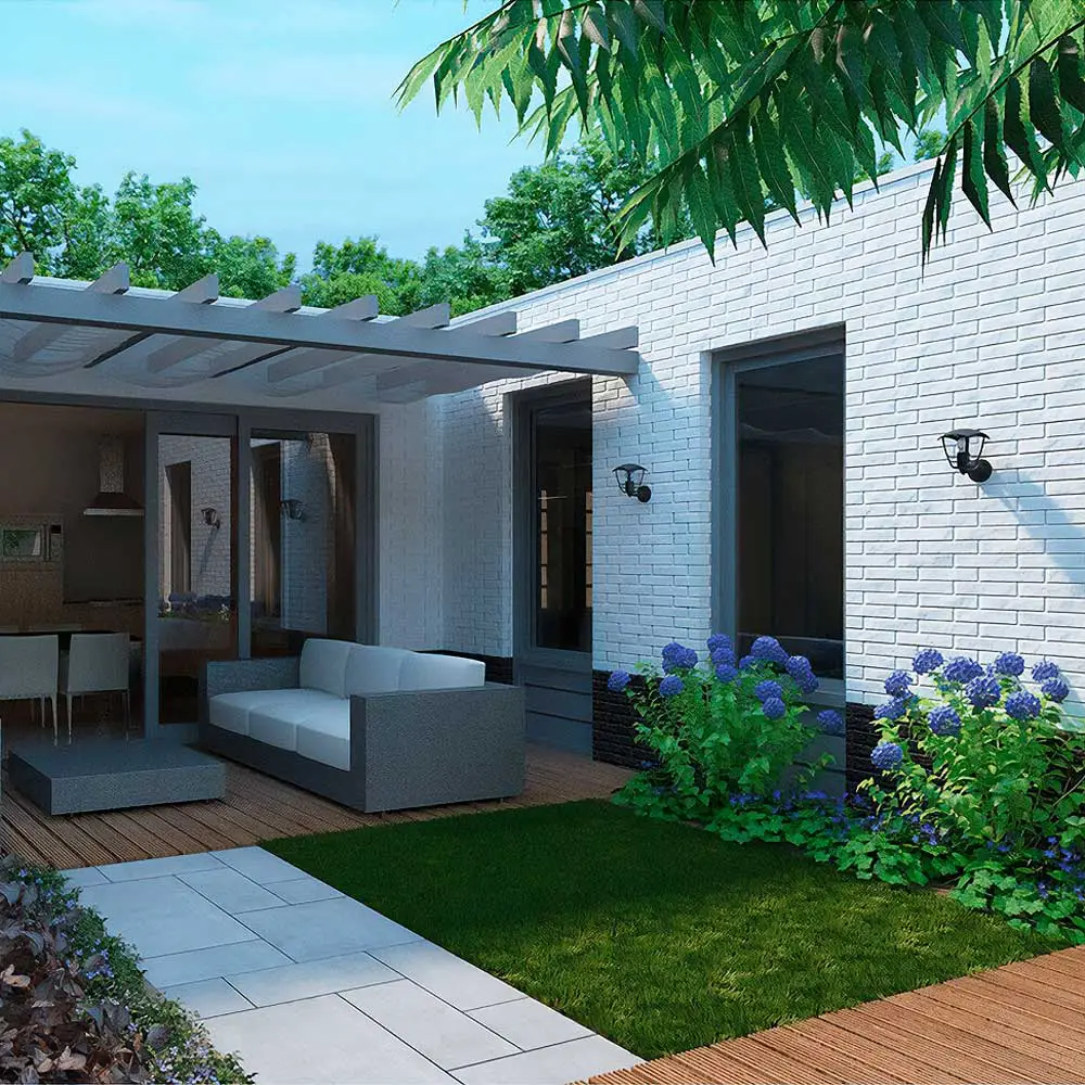 Aplique exterior Creek Up negro Philips IP44 instalado en fachada de vivienda