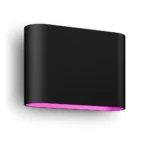 Aplique exterior Dymera Philips Hue negro encendido con luz rosa inferior.