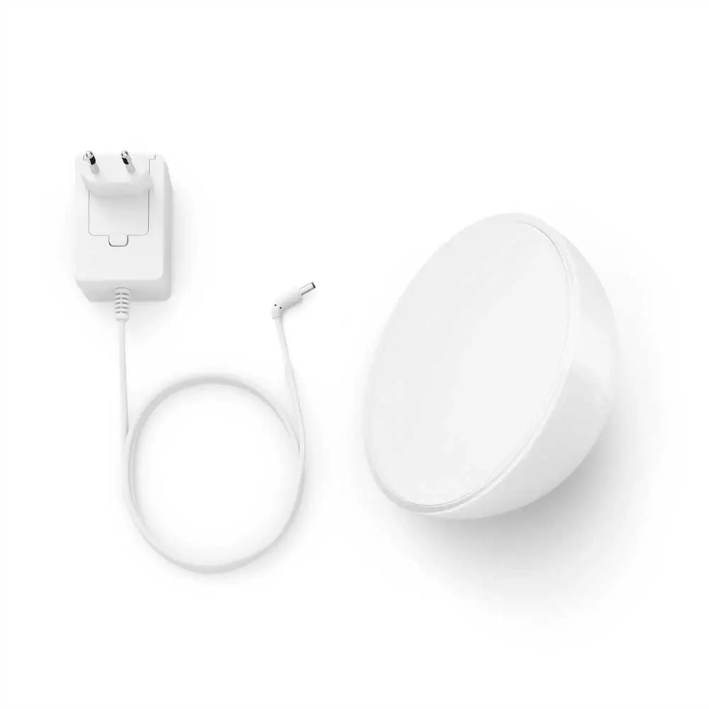 Accesorios incluidos de la lámpara Hue Go Philips Hue blanco con cable y adaptador de corriente.