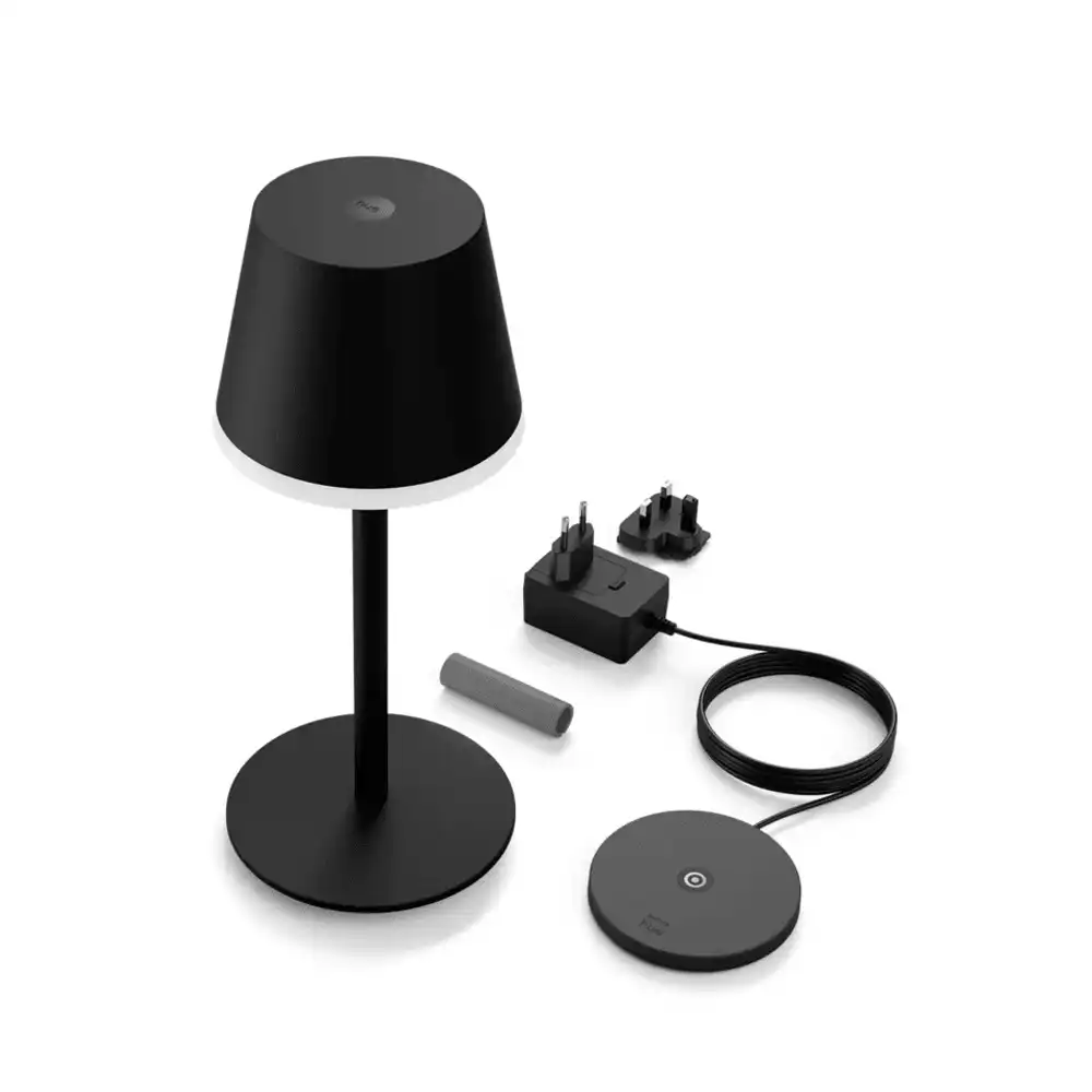 Contenido incluido con la lámpara portátil Philips Hue Go negra (base, cable y adaptador).