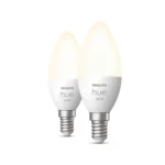 Pack 2 bombillas vela Philips Hue White 5.5W E14 encendidas con iluminación blanca cálida.