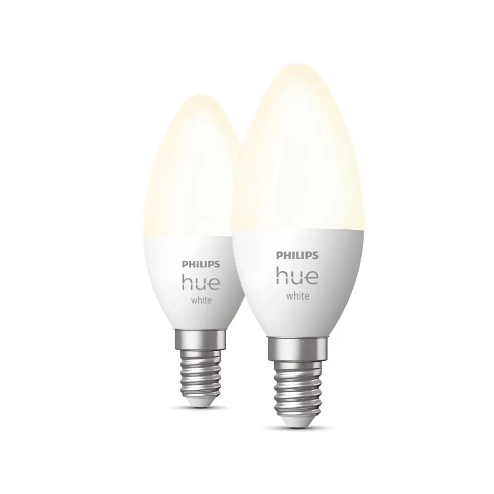 Pack 2 bombillas vela Philips Hue White 5.5W E14 encendidas con iluminación blanca cálida.