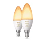 Pack 2 bombillas vela Philips Hue White Ambience 5,2W E14 encendidas en tono cálido.