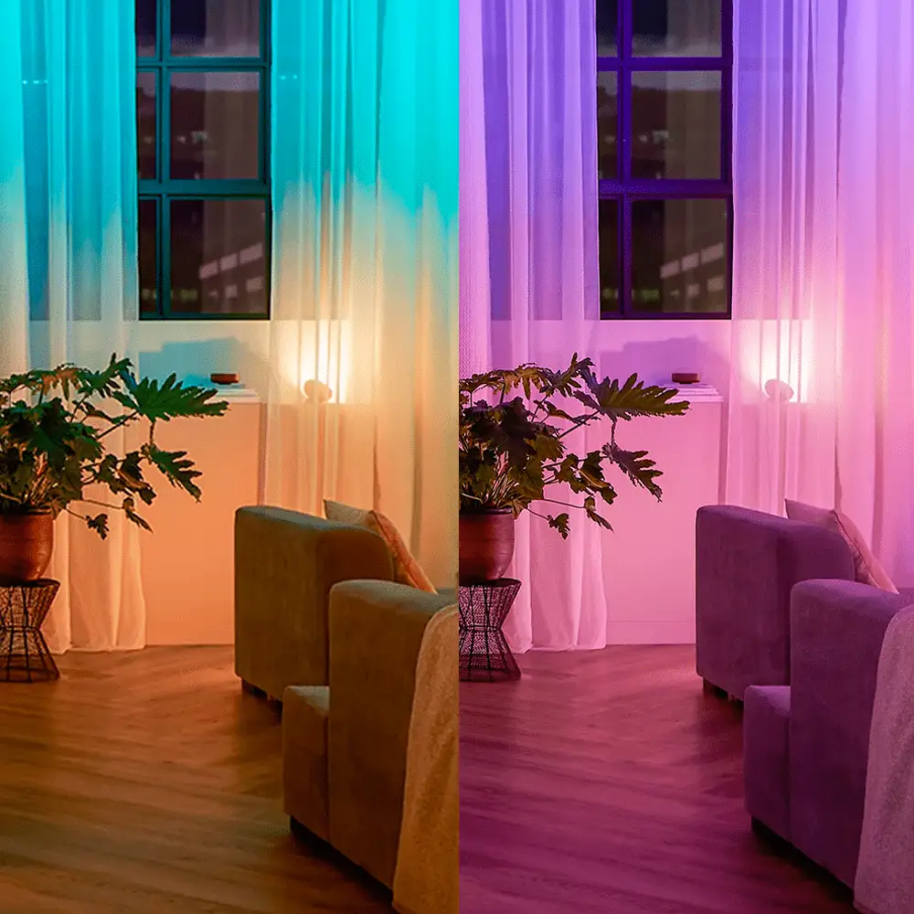 Iluminación ambiental multicolor con sistema Philips Hue en salón.