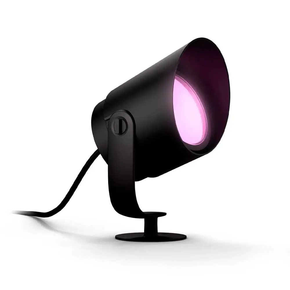 Detalle del foco pincho Lily XL Philips Hue encendido en color rosa.