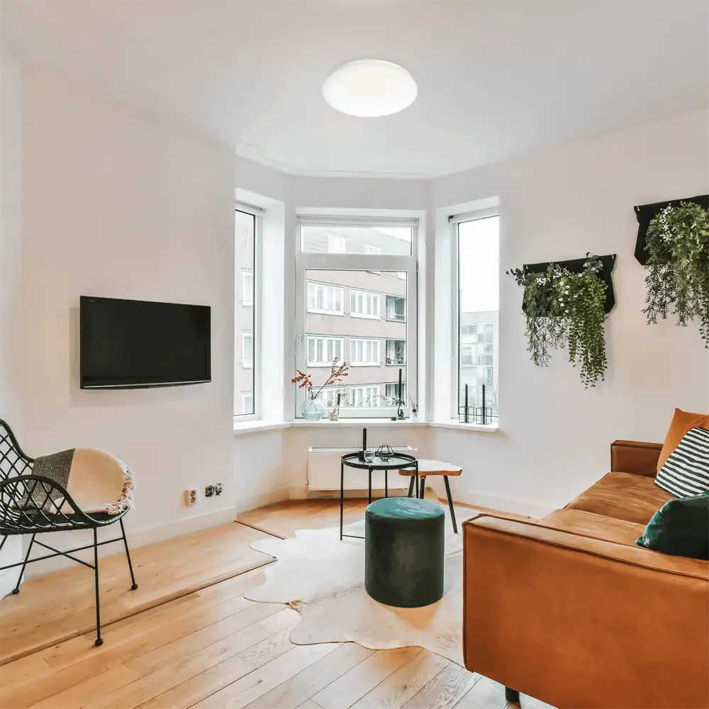 Plafón CL200 LED 17W 4000K Philips blanco instalado en salón moderno